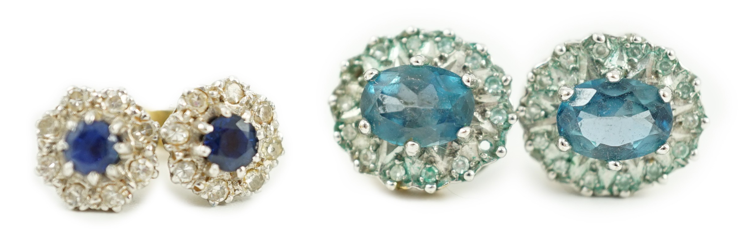 A modern pair of 18ct gold, sapphire and diamond cluster set ear studs, 8mm, gross weight 2.7 grams and a pair of 9ct ear studs, gross 3 grams.